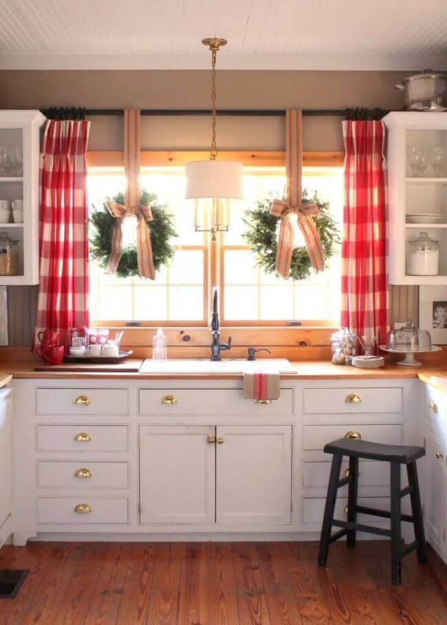 White farmhouse cabinets with gold hardware 