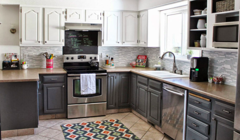 White Shaker-style kitchen cabinets with charcoal base cabinets