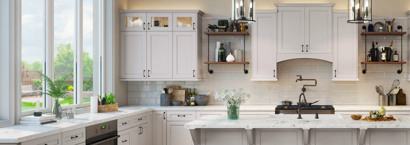 White kitchen cabinets with black handles