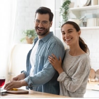 Happy couple in kitchen