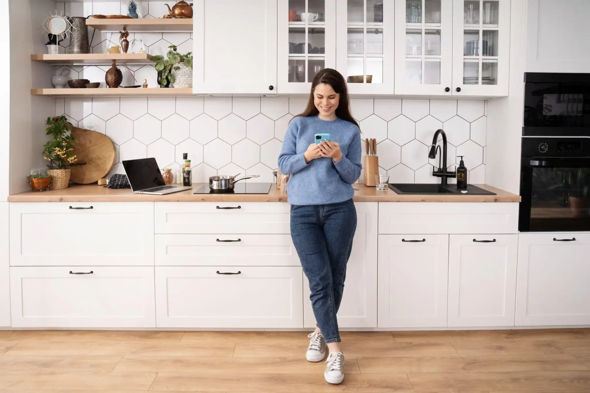 woman standing in a modern kitchen